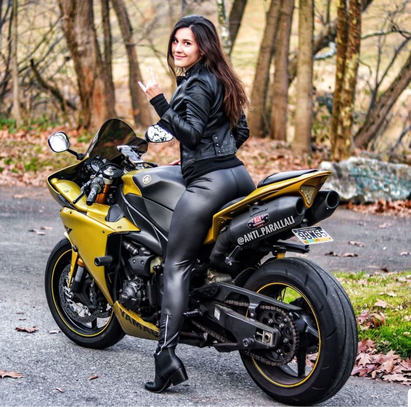 Sexy girl Brunettes on a motorcycle in Anda