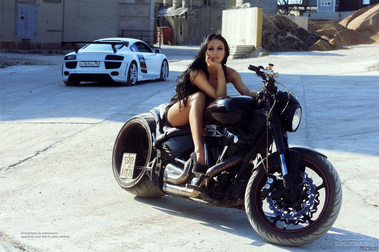 Sexy model Brunettes on a motorcycle in Anda